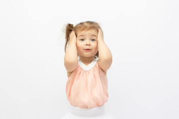 Portrait of surprised cute little toddler girl in sunglasses over pink background. Child model have fun and Advertising childrens products