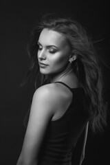 Naklejka premium Stylish studio portrait of a lovely brunette woman with perfect makeup