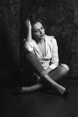 Fototapeta premium Studio portrait of a worried woman wears jeans and shirt