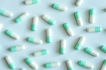 Pills. Medicines in capsules on a white background.