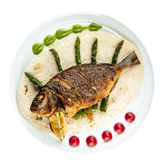 Isolated dish of gourmet grilled dorada fish on the white background
