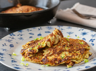 gluten free pancake made with puffed amaranth, eggs, zucchini and onions