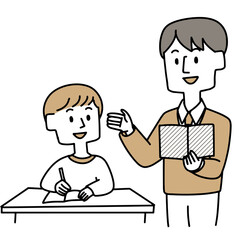 先生に勉強を教えてもらう男の子
