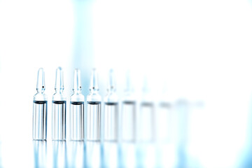 ampoules medicine vaccine concept, abstract background, vaccination virus protection