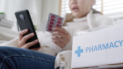 Young attractive beautiful asian female patient talk to doctor on cellphone videocall conference...