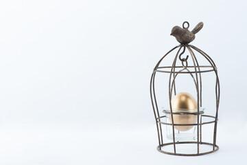 Golden Egg Easter in an Old Mini Cage