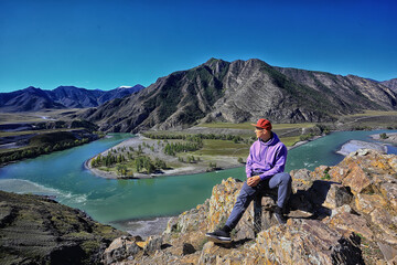 Fototapeta premium Man mountains meditation travel nature outdoor activities