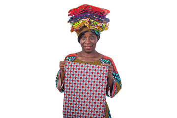 beautiful woman with traditional loincloth on her head is holding a loincloth in her hands smiling.