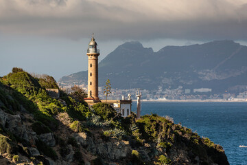 Fototapeta na wymiar Vista del faro de Punta Carnero y El peñon de Gibraltar, en Algeciras, Provincia de Cádiz, Andalucía, España