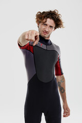 Dissatisfied surfer point with finger to camera