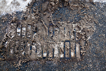 Drain grate on the road.