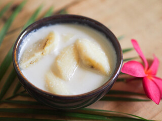 Closeup banana in coconut milk, Thai dessert sweet background.