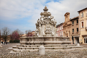 Cesena, Emilia-Romagna, Italy: the ancient square Piazza del Popolo with the fountain Fontana del Masini (1591) in the old town of the city