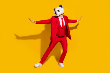 Photo of panda guy flirty boyfriend enjoy retro dance wear mask red tux tie shoes isolated on...