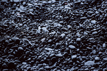 Black pebbles background