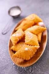 homemade fried bugne and sugar