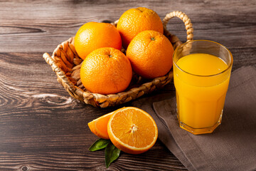 Glass with orange juice on the table. © WS Studio