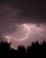 Lightning strike captured on night sky.