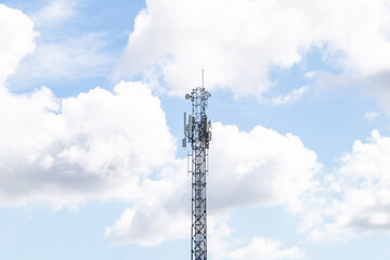 Telecommunication tower with antennas isolated on sky cloud  background. Wireless Communication Antenna Transmitter. Telecommunication tower 4G and 5G cellular Base Station Base Transceiver Station. 