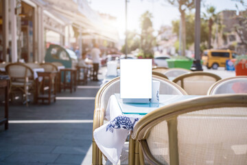 Empty menu frame with space for mockup stands on table
