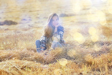 summer sunny portrait of a happy girl, female happiness sun glare straw field country style