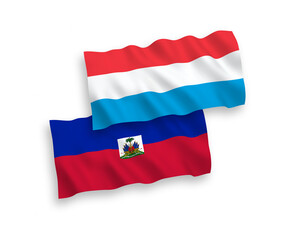 Fototapeta premium Flags of Republic of Haiti and Luxembourg on a white background