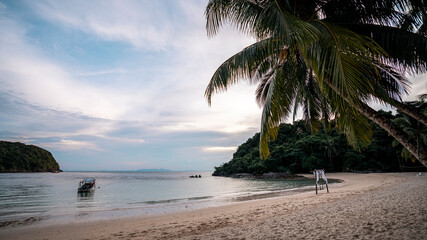 Fototapeta na wymiar Tropical beach and sunset