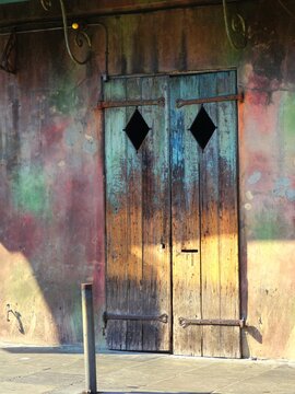 Wooden door of an old building along the street