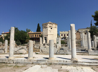 The Tower of the Winds is an octagonal Pentelic marble clocktower in the Roman Agora in Athens that functioned as a horologion or "timepiece". It is considered the world's first meteorological station