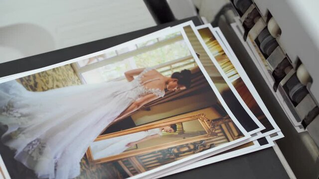 chemical printing of wedding photos in the photo laboratory. 