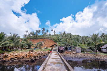 Asian fishing village on the sea shore.