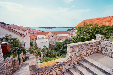 Beautiful view of Hvar old town on the sea shore. - obrazy, fototapety, plakaty