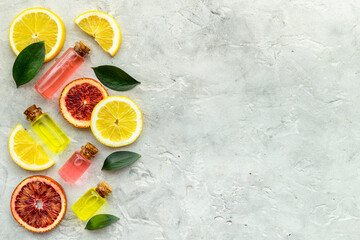 Citrus cosmetic with vitamin c and fruits essential oil. Top view