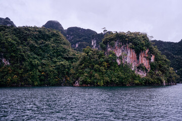Beautiful landscape with lake, mountains and natural attractions on Cheow Lan Lake at Khao Sok National Park, Surat Thani Province, Thailand.