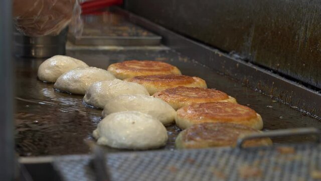 Korean traditional food, pancake stuffed with brown sugar, which is called Hotteok
