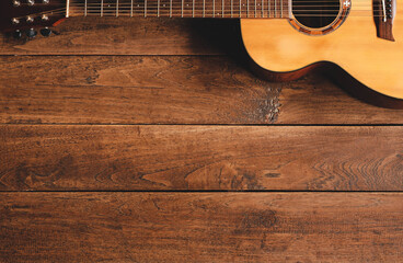 classical guitar on wooden background - obrazy, fototapety, plakaty