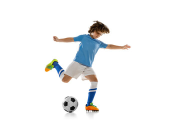 Fototapeta na wymiar Portrait of preschool boy, football soccer player in action, motion training isolated on white studio background. Concept of sport, game, hobby