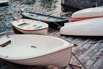Fototapeta na wymiar Wooden boats moored in the harbor marina.