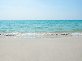 Fototapeta na wymiar Blue ocean and clear sky landscape with beach