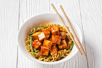 asian noodle bowl with hoisin baked tofu cubes