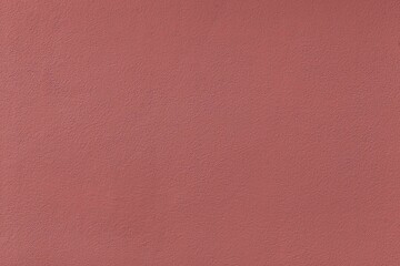 The cement wall is painted brown with a pattern texture and background seamless