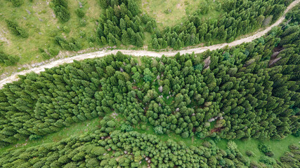 Top view Aerial photo from flying drone over Curvy road up Mountains and winding mountain paths.