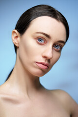 Natural beauty. Beautiful young woman with smooth glowing skin.