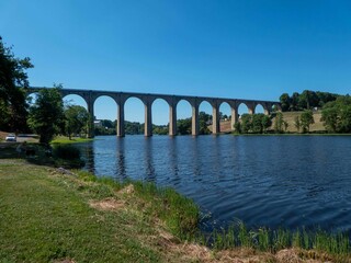 old railway viaduct over the river Vienne at L'Isle Jourdain in France built in 1884