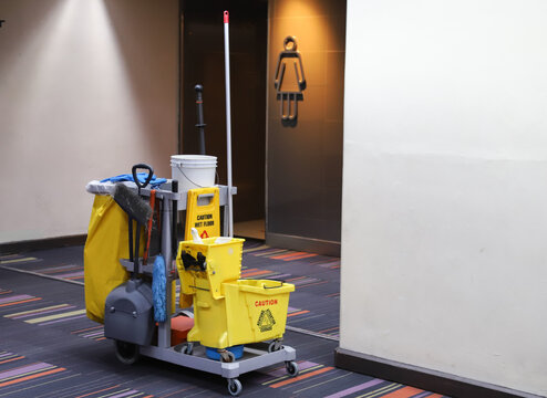 Closeup of janitorial, cleaning equipment and tools for floor cleaning at airport terminal. 