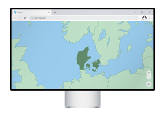 Computer monitor with map of Denmark in browser, search for the country of Denmark on the web mapping program.