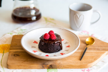 chocolate fondant cake. Mini cake for fondant with icing. Delicious  dessert.Homemade chocolate lava cake.Fondant Lava Cupcake.Warm chocolate dessert.Chocolate cake.Cupcake with berries.Breakfast 