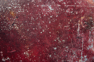 Aged rusty red weathered metal background with cracks, scratches and spots or grunge rough surface 
 backdrop.