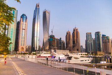 Fototapeta na wymiar Dubai, UAE - 07.19.2021 View of a towers in Dubai Marina district from Dubai harbor. Outdoor