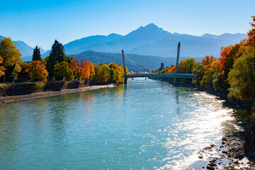 Fototapeta na wymiar Railway bridge over the Inn River in Innsbruck, Austria on October 15 2016